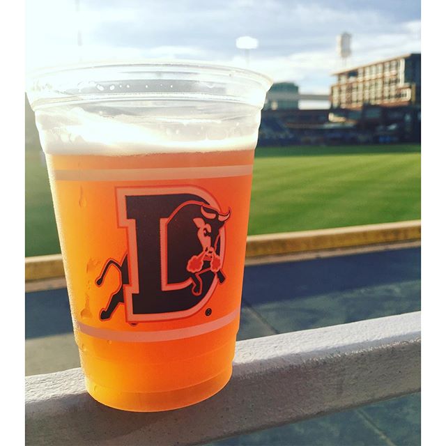 Take me out to the ballgame! Blood Orange High Roller is available at @durhambulls and pairs well with peanuts and crackerjacks. #craftbeer #ncbeer #durham #raleigh #chapelhill #drinklocal
